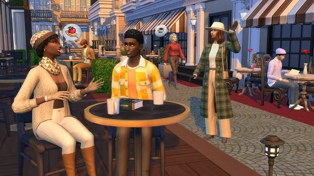 Two Sims sit at an outdoor café table chatting over coffee, while another Sim in a green plaid overcoat and wide-brim hat walks by. Other Sims can be seen enjoying the lively street setting in the background.