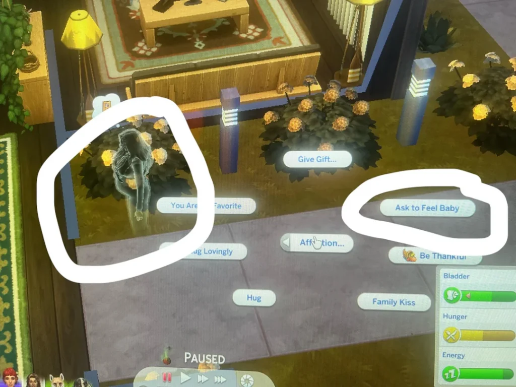 A ghostly Sim with a visible pregnancy glow stands in a room, with interaction options showing “Ask to Feel Baby” on the screen.