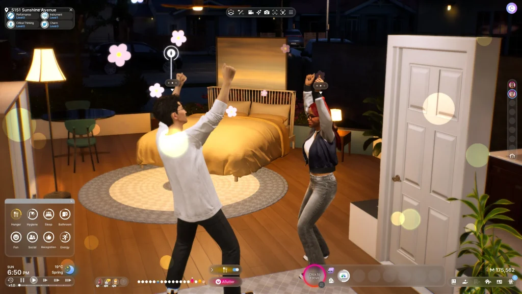 Two Sims celebrating with raised fists inside a warmly lit bedroom at night, surrounded by playful mood effects and floating icons in The Sims 4.