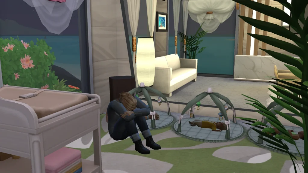 A grieving Sim sits curled up on the floor with their head in their arms beside two baby play mats, while a toddler sleeps nearby in a quiet Sims 4 nursery.