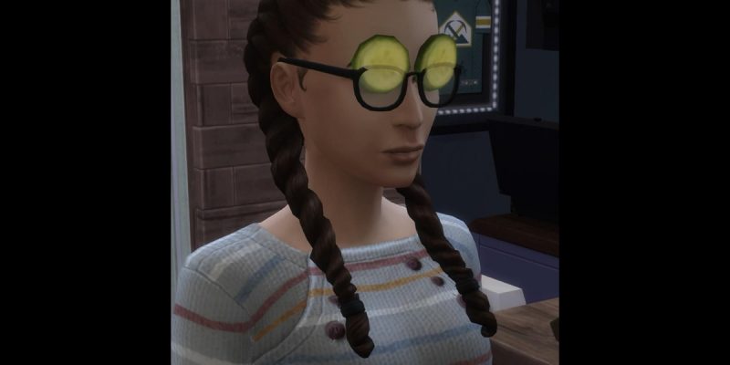 A female Sim with cucumbers under her glasses.